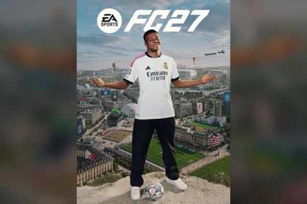 Kylian Mbappé, luciendo la camiseta del Real Madrid con los logos de Emirates y Adidas, posa sonriente con un balón de fútbol a sus pies en la portada de EA Sports FC 27, con un extenso paisaje urbano de fondo y el logo del juego.