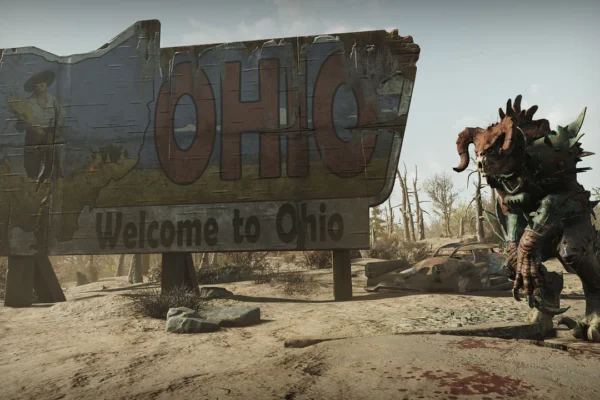 Una criatura mutante con cuernos y pinchos, similar a un Sanguinario de Fallout, se yergue amenazante junto a un letrero destrozado de 'Welcome to Ohio' en un paisaje post-apocalíptico, simbolizando los peligros que aguardan en el nuevo proyecto de Fallout de Bethesda y Obsidian.