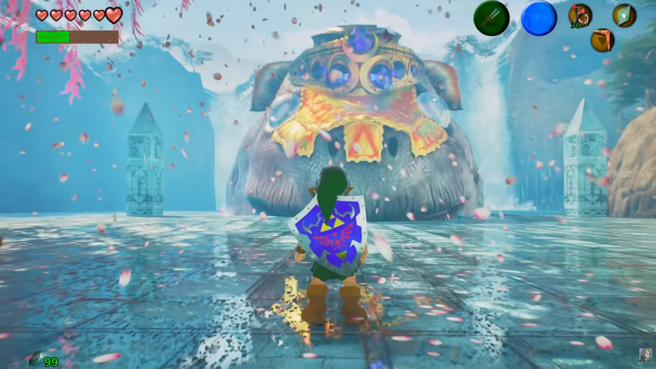 Link, protagonista de The Legend of Zelda, se erige en un vasto entorno acuático sembrado de pétalos rosados, mirando una imponente estructura gigante con adornos dorados y azules, flanqueada por dos torres góticas. La interfaz de usuario del juego, con corazones y medidores, es visible en la parte superior.