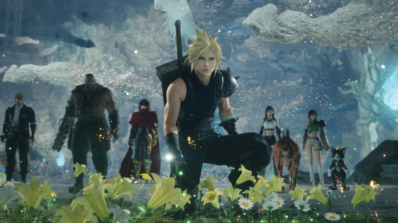Cloud Strife se arrodilla heroicamente entre flores luminosas, flanqueado por el elenco principal de la trilogía Final Fantasy VII Remake: Barret, Yuffie, Tifa, Aerith, Red XIII y Cait Sith. La escena, ambientada en una caverna mística, ilustra la envergadura del grupo para la conclusión épica de Final Fantasy VII Revelation.