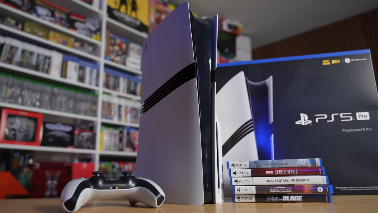 The PlayStation 5 Pro console and its official retail packaging displayed on a desk, highlighting the hardware at the center of the new purchase requirements in Japan.