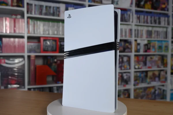 The PlayStation 5 console displayed on a rotating stand, representing the hardware subject to new purchase requirements in Japan.
