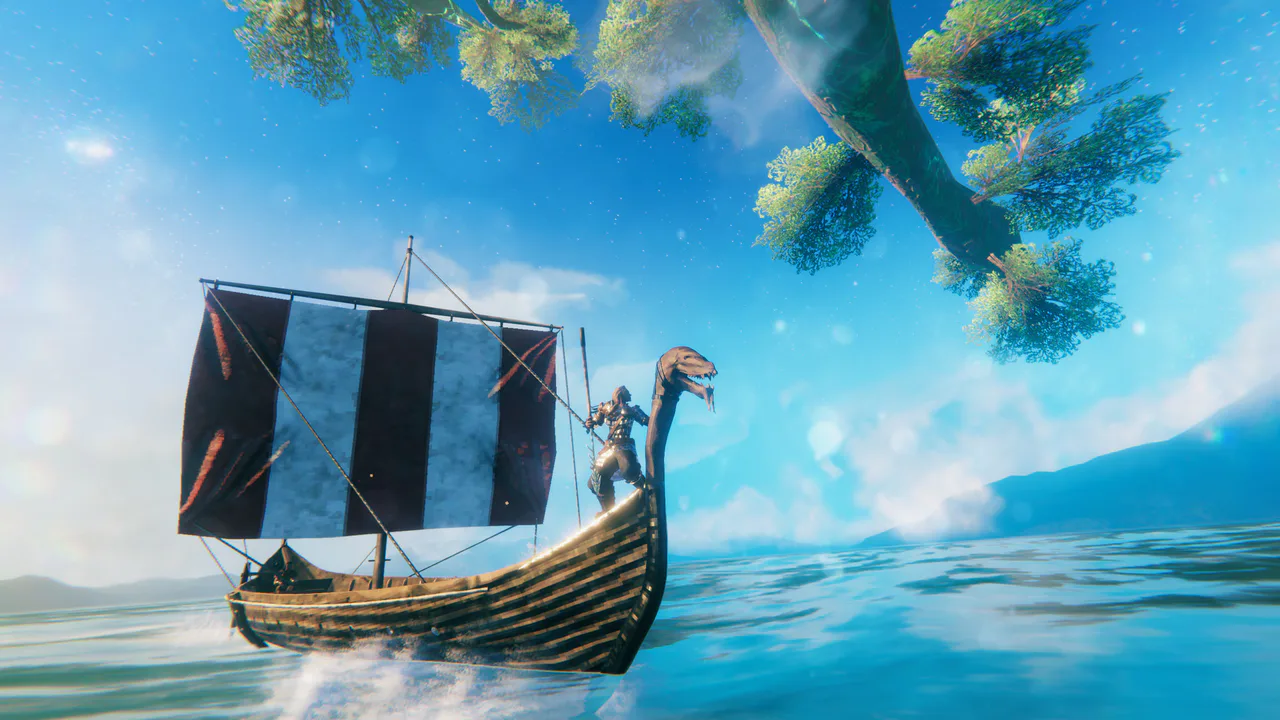 Un drakkar vikingo con un personaje blindado en la proa navega por el mar de Valheim bajo el majestuoso Árbol del Mundo. Esta vibrante captura de pantalla ilustra la exploración y los impresionantes paisajes que los jugadores encontrarán en la versión 1.0 del juego.