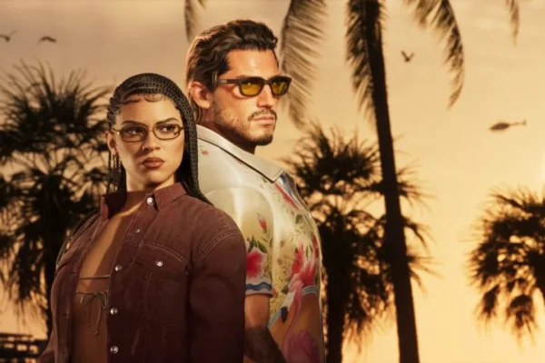 Los protagonistas Lucia y Jason de Grand Theft Auto VI observan el horizonte en una puesta de sol tropical, representando el arte promocional oficial del esperado videojuego.