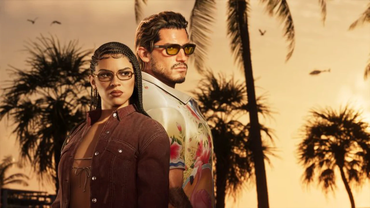 Los protagonistas Lucia y Jason de Grand Theft Auto VI observan el horizonte en una puesta de sol tropical, representando el arte promocional oficial del esperado videojuego.