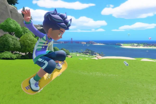 A character performing a skateboard jump above a lush green field in Nintendo Switch Sports Resort, with Wuhu Island's bay in the background.